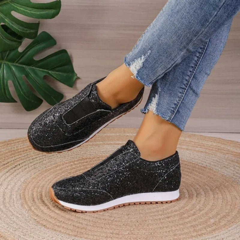 Glitzernder Slipper mit kontrastierender Sohle