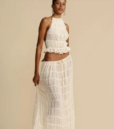 Top met halternek &amp; halflange rok