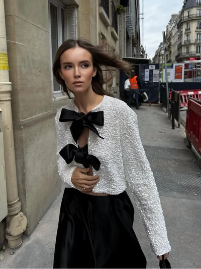 Imani™ | Glitzerndes Oberteil mit Schleife