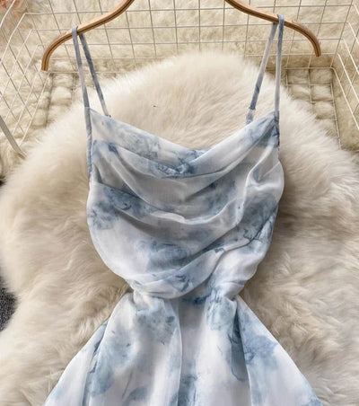 Irene Sommerkleid | Elegantes modernes Blumen-Midikleid mit Spaghettiträgern und rückenfreiem Design