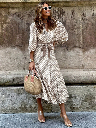 Elegantes Damen Wickelkleid - Stilvolles Midikleid mit ausdrucksstarkem Muster und Gürtel