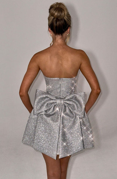 Keziri™ | Glitzerndes Minikleid mit Schleife hinten